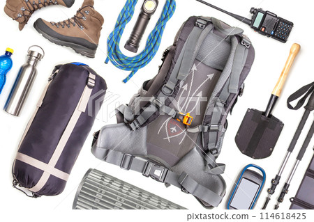 Set of tourist trekking items on white background. Top view of accessories for travel 114618425