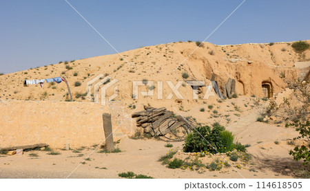 Dwelling of people, representatives of troglodyte tribe east of Sahara Desert. 114618505