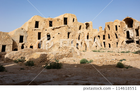 Uninhabited fortified village with houses and granaries, Tunisia. Ksar of Mgabla, Berber, Tataouine. Uninhabited fortified village with houses and granaries, Tunisia. Ksar of Mgabla, Berber, Tataouine. 114618551