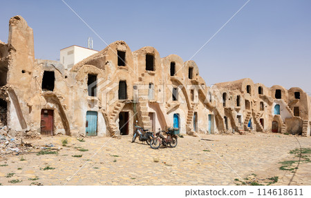 Fortified village with houses and granaries, sights of Tunisia. Ksar of Medenine, Berber, Tataouine Fortified village with houses and granaries, sights of Tunisia. Ksar of Medenine, Berber, Tataouine 114618611