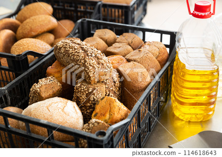 bread with cereals in baking black box in kitchen 114618643