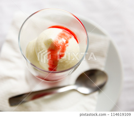 Tasty strawberry mousse in glass with strawberry sauce. Delicate dessert Tasty strawberry mousse in glass with strawberry sauce. Delicate dessert 114619109