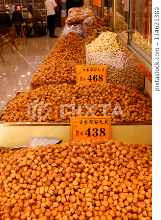 Japanese dried scallops sold at a dry food store in Tokusuke, West Hong Kong. The highest grade is Japanese and expensive Japanese dried scallops sold at a dry food store in Tokusuke, West Hong Kong. The highest grade is Japanese and expensive 114621389