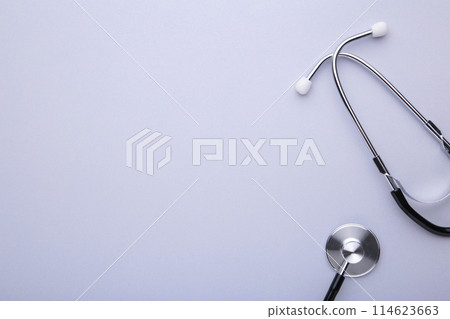 Medical stethoscope on a grey background. Health care concept 114623663