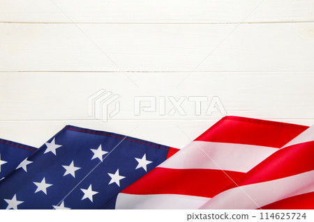 American flag on white wooden background with copy space American flag on white wooden background with copy space 114625724