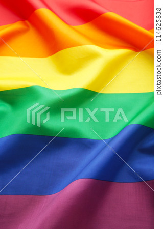A rainbow flag background with copy space. Vertical foto 114625838