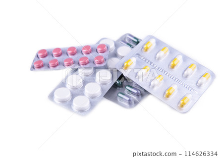 White pills in blister isolated on white background White pills in blister isolated on white background 114626334