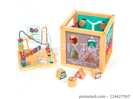 Wooden eco-friendly busy board cube - educational toy for children and babies on a white background Wooden eco-friendly busy board cube - educational toy for children and babies on a white background 114627567