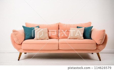 Peach color sofa with pillows 114628579