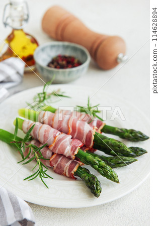 Asparagus and bacon ready for cooking Asparagus and bacon ready for cooking 114628894