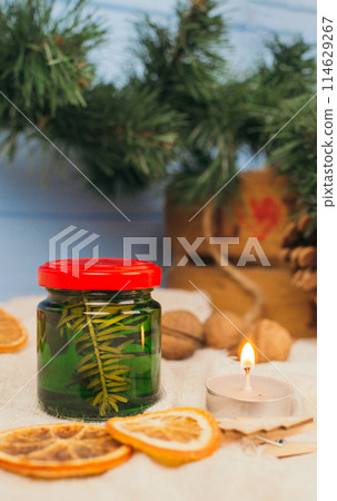 Fir tree bump jam on wooden background Fir tree bump jam on wooden background 114629267