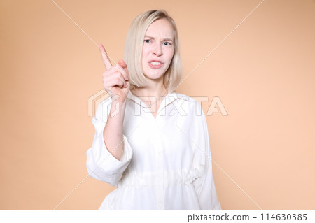 Foreign woman's facial expression Foreign woman's facial expression 114630385
