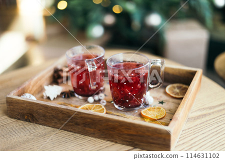Christmas sweets and tea cups, festive composition. Christmas decor on wooden table background. Christmas and new year holiday concept. atmosphere tradition christmas image 114631102