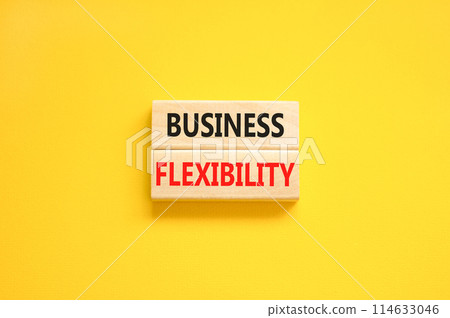 Business flexibility symbol. Concept words Business flexibility on beautiful wooden block. Beautiful yellow paper background. Business flexibility concept. Copy space. 114633046