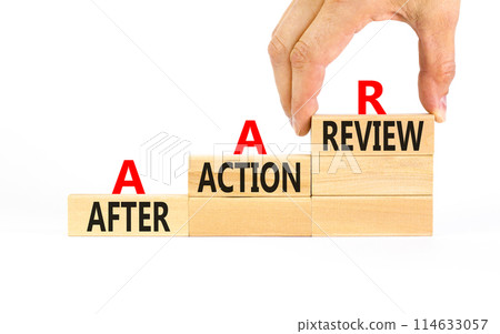 AAR After action review symbol. Concept words AAR After action review on beautiful wooden blocks. Businessman hand. Beautiful white background. Business AAR after action review concept. Copy space. 114633057