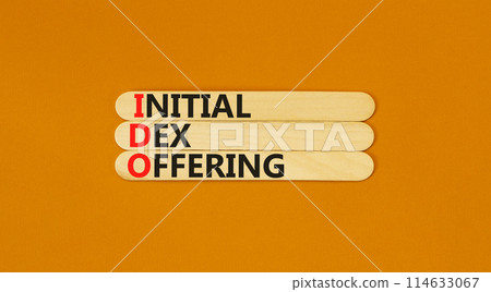 IDO initial DEX offering symbol. Concept words IDO initial DEX offering on beautiful wooden stick. Beautiful orange background. Business IDO initial DEX offering concept. Copy space. 114633067