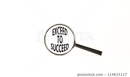 Exceed to succeed symbol. Concept words Exceed to succeed in beautiful magnifying glass. Beautiful white table white background. Business and exceed to succeed concept. Copy space. 114633117