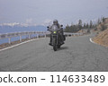 A motorcycle ride along the Utsukushigahara Skyline with the Hakuba mountain range in the background 114633489