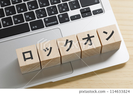A building block with the word "lock on" written on it 114633824