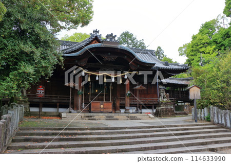 Muko-Jinja Shinto Shrine in Muko City of Kyoto Japan. Founded in the year 718 by the Mutobe clan as requested by Emperor Jinmu. Its design was copied by the Meiji Jingu in Tokyo. Muko-Jinja Shinto Shrine in Muko City of Kyoto Japan. Founded in the year 718 by the Mutobe clan as requested by Emperor Jinmu. Its design was copied by the Meiji Jingu in Tokyo. 114633990