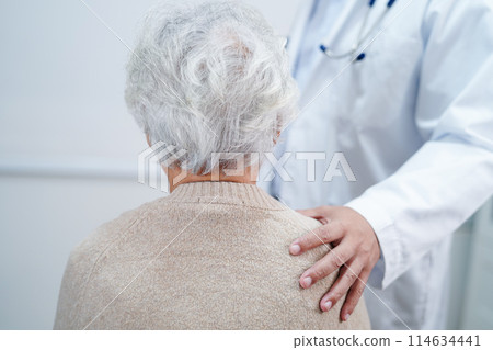 Asian doctor touching patient to support, consolation encourage and help support health care medical. 114634441