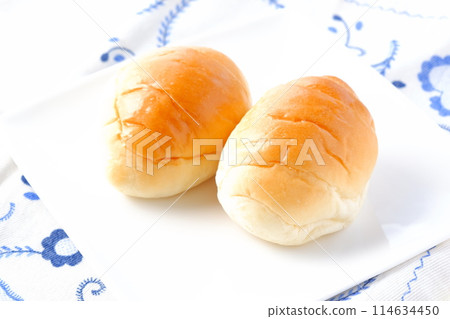 Breakfast table with butter rolls Breakfast table with butter rolls 114634450