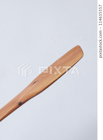 Wooden kitchen utensils stacked view, spoon and spatula close up Wooden kitchen utensils stacked view, spoon and spatula close up 114635557