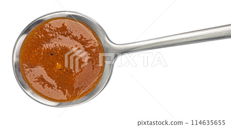 Beef stew sauce in spoon isolated on white background, top view 114635655
