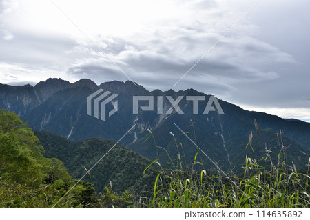 The Hotaka mountains as seen from the middle of Kasashindo trail The Hotaka mountains as seen from the middle of Kasashindo trail 114635892