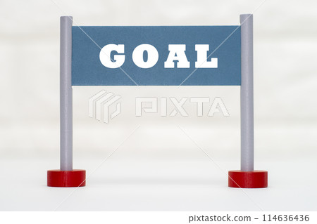 A gate ornament with the word GOAL written on it A gate ornament with the word GOAL written on it 114636436