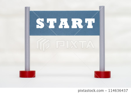 A gate ornament with the word "start" written on it 114636437