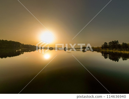 "Aomori Prefecture" The beautiful Tsuru-no-Mai Bridge illuminated by the morning sun 114636940