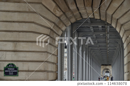 Horizontal perspective view of Metal columns of elevated subway at Pont de Bir Hakeim bridge. Horizontal perspective view of Metal columns of elevated subway at Pont de Bir Hakeim bridge. 114638078