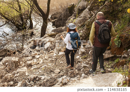 senior friends tourists outdoor adventure together on mediterranian sea landscape 114638185