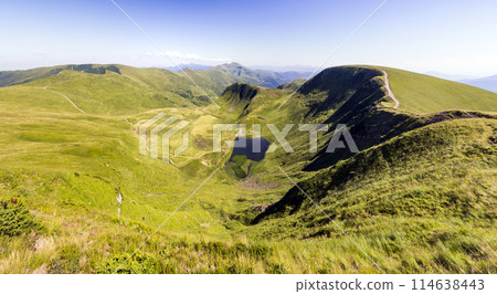 Wide panorama of green mountain hills. Carpathian mountains in summer. 114638443