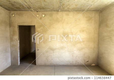 Interior of a room in new apartment under renovation Interior of a room in new apartment under renovation 114638447