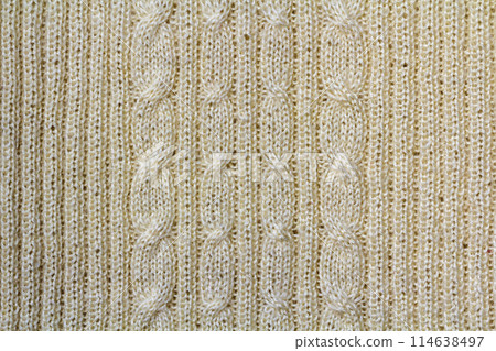 Background texture of beige pattern knitted fabric made of cotton or wool closeup Background texture of beige pattern knitted fabric made of cotton or wool closeup 114638497