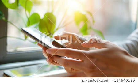 Women handling smartphone 114640189