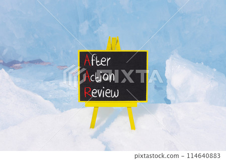 AAR After action review symbol. Concept words AAR After action review on beautiful yellow blackboard. Beautiful blue ice background. Business AAR after action review concept. Copy space. 114640883