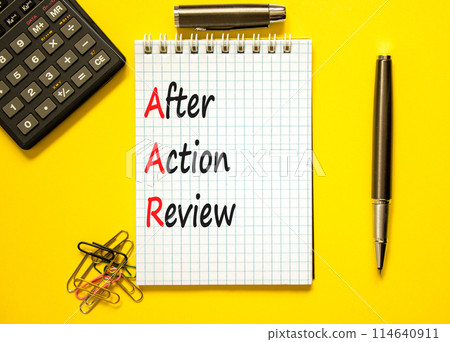AAR After action review symbol. Concept words AAR After action review on beautiful white note. Beautiful yellow background. Black calculator. Business AAR after action review concept. Copy space. AAR After action review symbol. Concept words AAR After action review on beautiful white note. Beautiful yellow background. Black calculator. Business AAR after action review concept. Copy space. 114640911