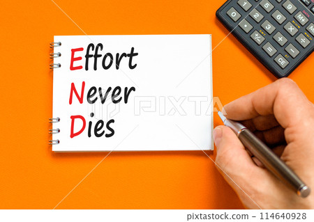 END effort never dies symbol. Concept words END effort never dies on beautiful white note. Beautiful orange background. Businessman hand. Business END effort never dies concept. Copy space. END effort never dies symbol. Concept words END effort never dies on beautiful white note. Beautiful orange background. Businessman hand. Business END effort never dies concept. Copy space. 114640928