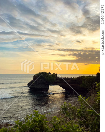 View of Tanah Lot, traditional balinese temple at sunset 114642172