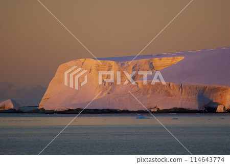 Lemaire strait coastal landscape, mountains and icebergs, Antarctic Peninsula, Antartica. 114643774