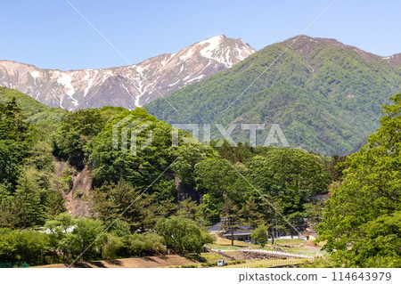 Mt. Tanigawa seen from the Suwakyo Promenade in Minakami Onsen Mt. Tanigawa seen from the Suwakyo Promenade in Minakami Onsen 114643979