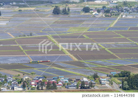 Aizu Basin scenery in early summer and a train on the Tadami Line, aerial view from Futanuma, Aizu Misato Town, Fukushima Prefecture Aizu Basin scenery in early summer and a train on the Tadami Line, aerial view from Futanuma, Aizu Misato Town, Fukushima Prefecture 114644398