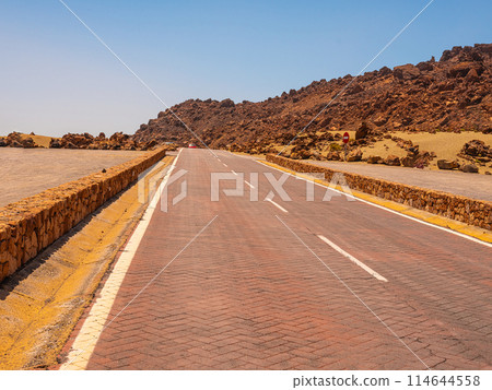 spot in Tenerife with many red rocks and beautiful mountain landscape background 114644558