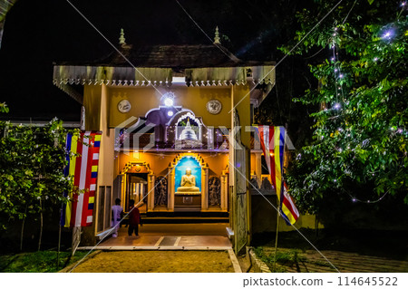 traditional Sri Lankan white temple stupas in evening. traditional Sri Lankan white temple stupas in evening. 114645522