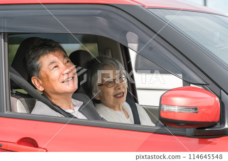 Elderly couple driving a car (drive, senior, man and woman) Elderly couple driving a car (drive, senior, man and woman) 114645548