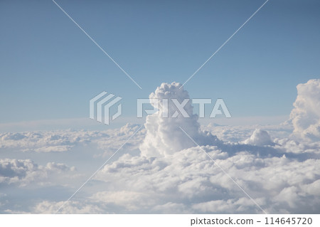 Sunrise above textured clouds from airplane window 114645720