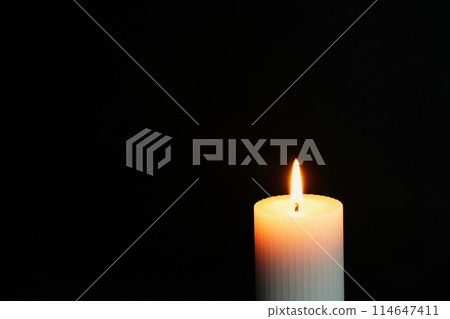 A candle that glows in the dark A candle that glows in the dark 114647411